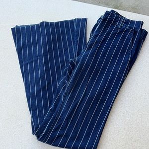 Litz size 28 mid rise flare stripe jeans.